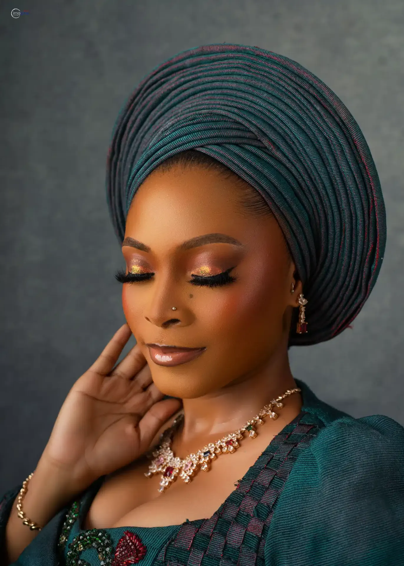 Classytoks Makeovers signature look — green gele bridal glam